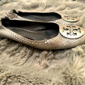 Silver snakeskin Tory Burch flats. Well loved but still such a great shoe.